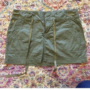 Express skirt. Green with gold buttons and detail