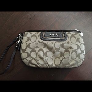 Coach brown and tan wristlet