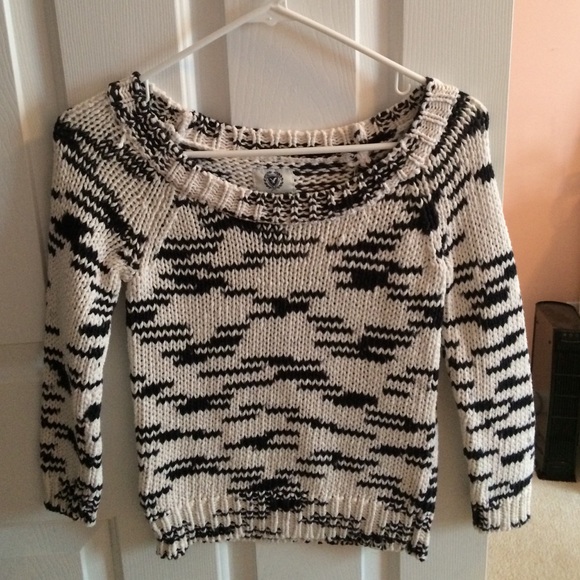 Knit sweater.