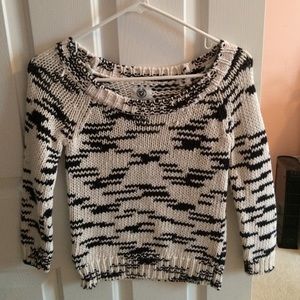Knit sweater.