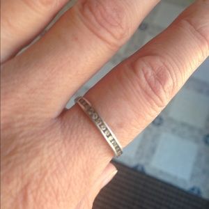 14 kt white gold channel wedding band.