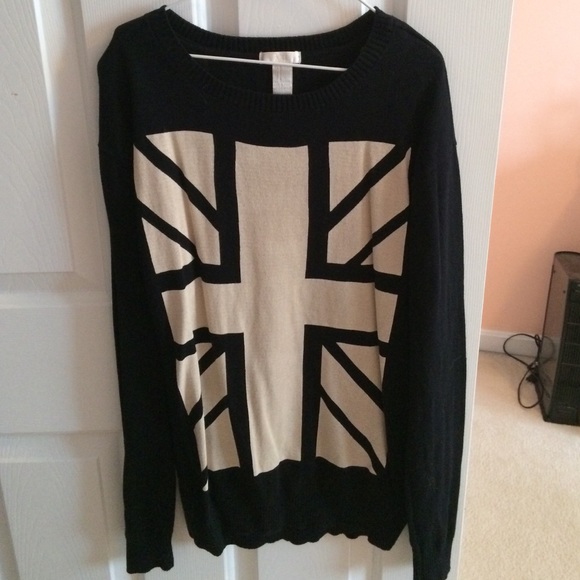 Long creme and black sweater.