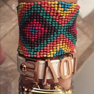 "LOVE" and beaded bracelets; sold together