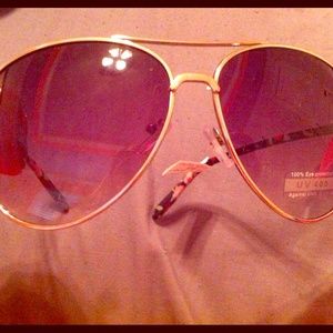 Gold aviator sunglasses with floral design