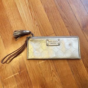 Gold Kate Spade wristlet