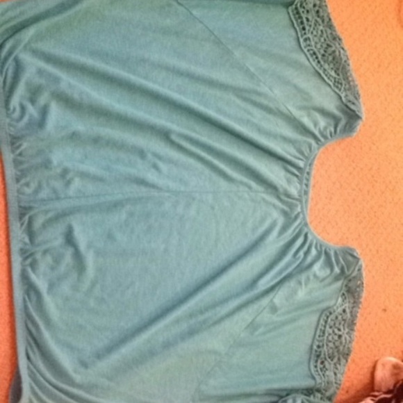 Turqoise loose shirt from lane bryant.