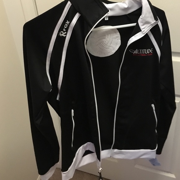 A black volleyball warm up