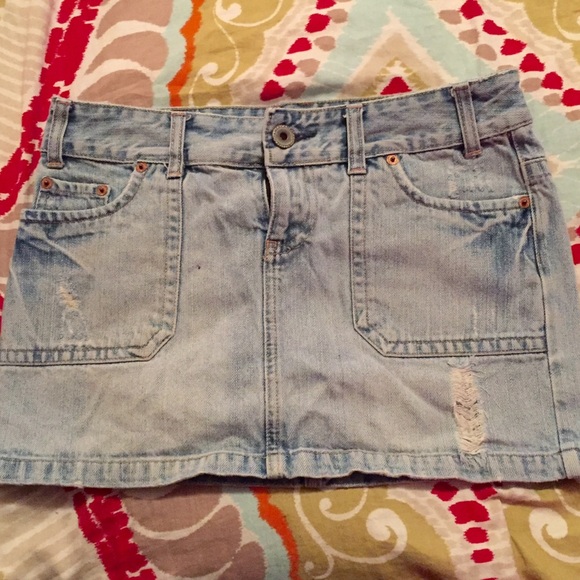 Distressed Denim Mini Skirt.