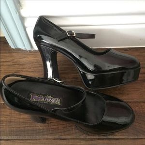Costume platform heels in black NEW