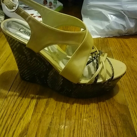 Nude and snakeskin wedges