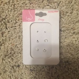 6 brand new nose rings, still sealed!