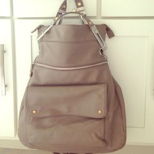 Grey leather BCBG generation purse with metal det