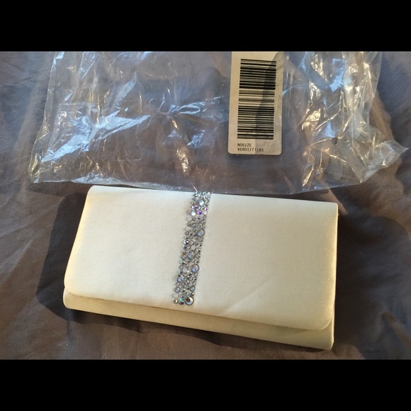 Brand new Aldo cream sequined clutch with strap