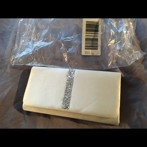 Brand new Aldo cream sequined clutch with strap