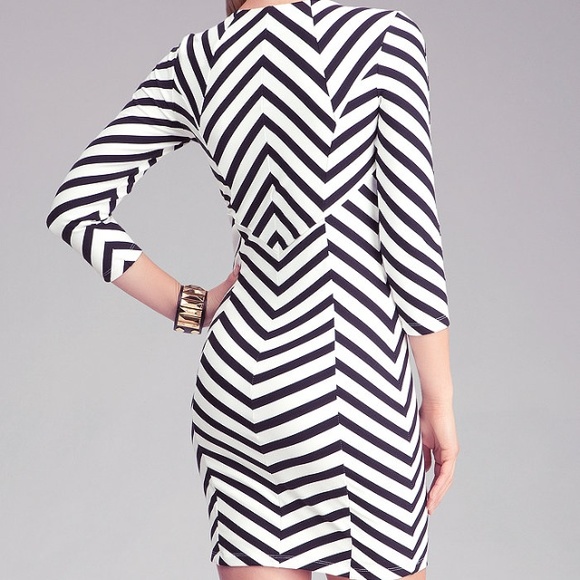 Bebe black & white strips dress size x small