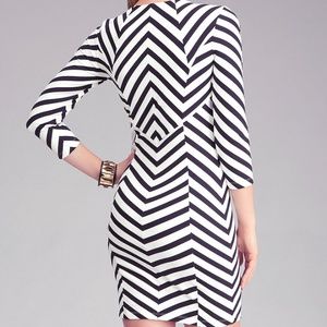 Bebe black & white strips dress size x small