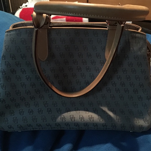 Dooney and Bourke pocketbook excellent condition.