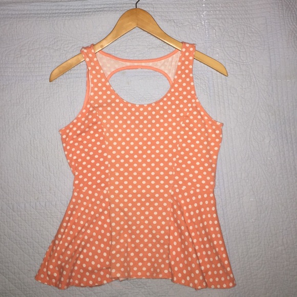 Peach polka dot peplum top