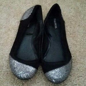Black and silver flats