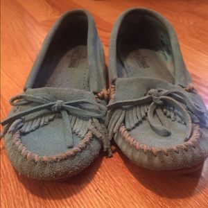 Blue blue Minnetonka moccasins.