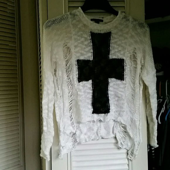 Distressed cross sweater