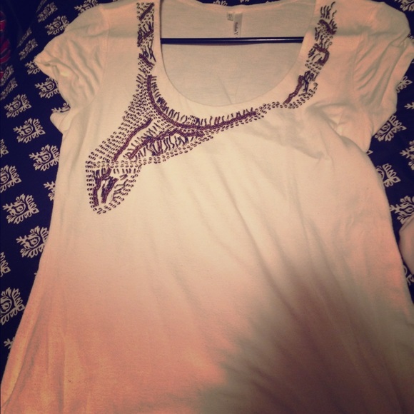 Cute white top with jewels on neck line