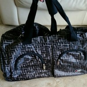 Brand new carry on duffle bag with wheels