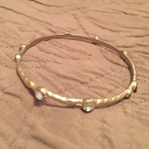 Gold hammered bracelet with diamonds