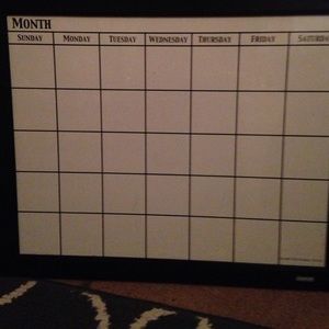Dry erase calendar.