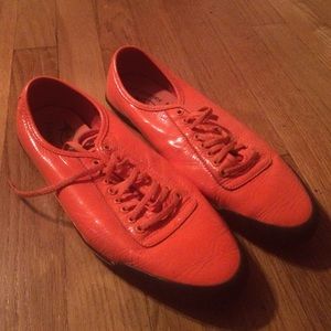 Bright orange sneakers