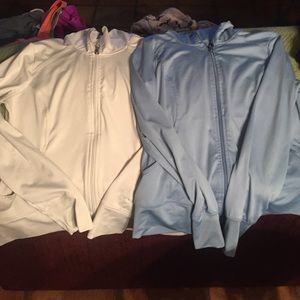 Lt. blue and white athletic zip ups