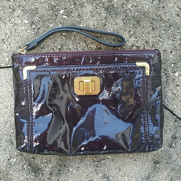 JUICY COUTURE  Wine color wristlets & comestic bag