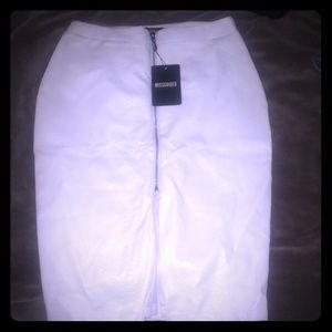 White snakeskin midi with zip up front. NWT