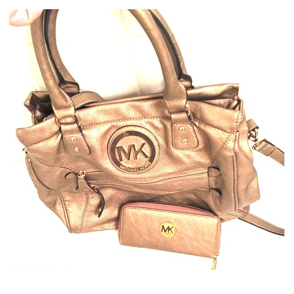 Lg designer inspired handbag $ matching wallet.