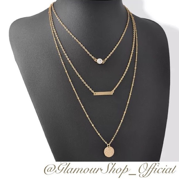 Gold tone multi layered necklace