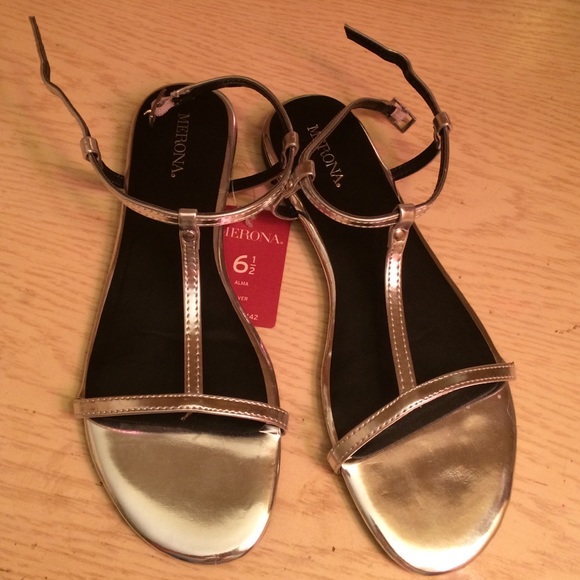 Women's size 6 1/2 silver sandals. NWT