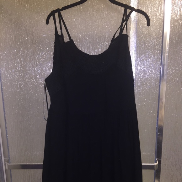 Black embroidered dress.