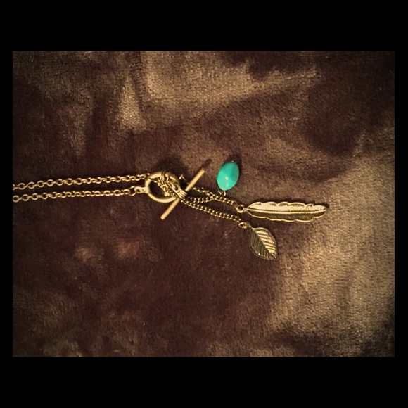 Gold feather necklace