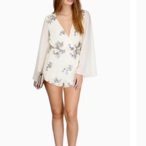 Romper embroidered in sequence flowers