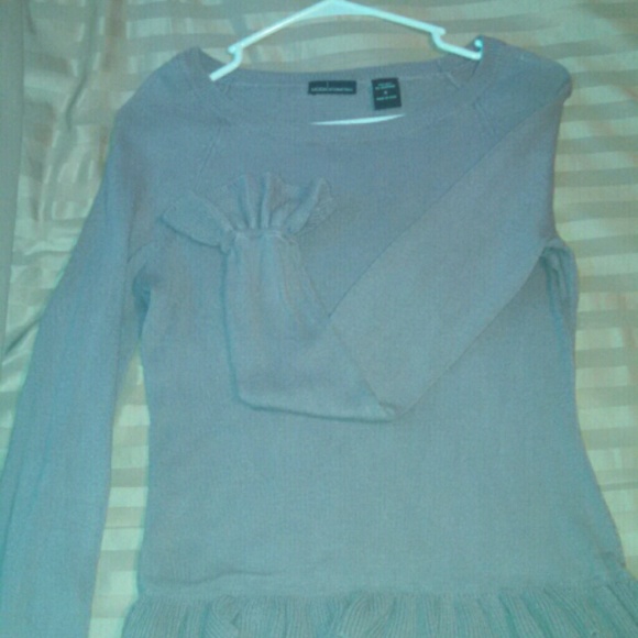 Grayish purple sweater.