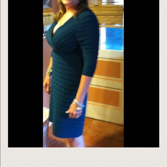 Dark green  pleated dress I am 5'7 at my knee