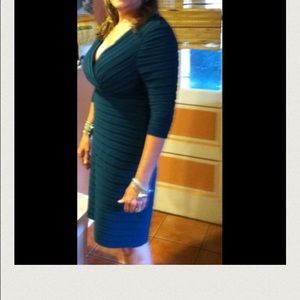 Dark green  pleated dress I am 5'7 at my knee