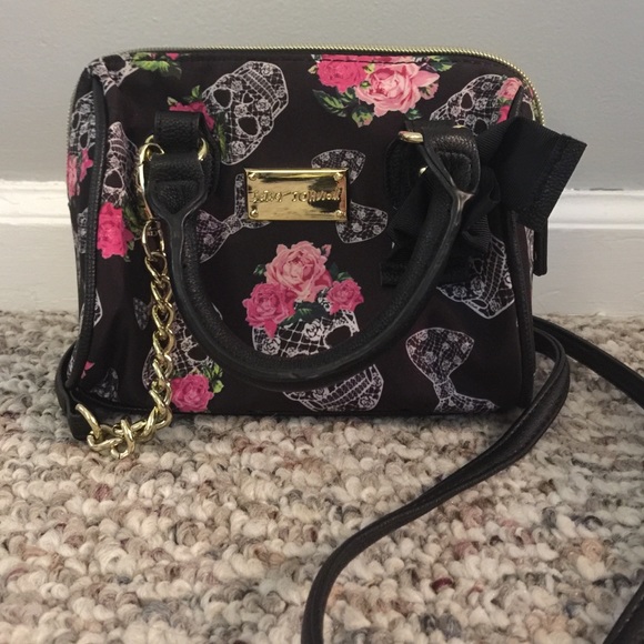 Betsy Johnson skull and roses cross body bag.