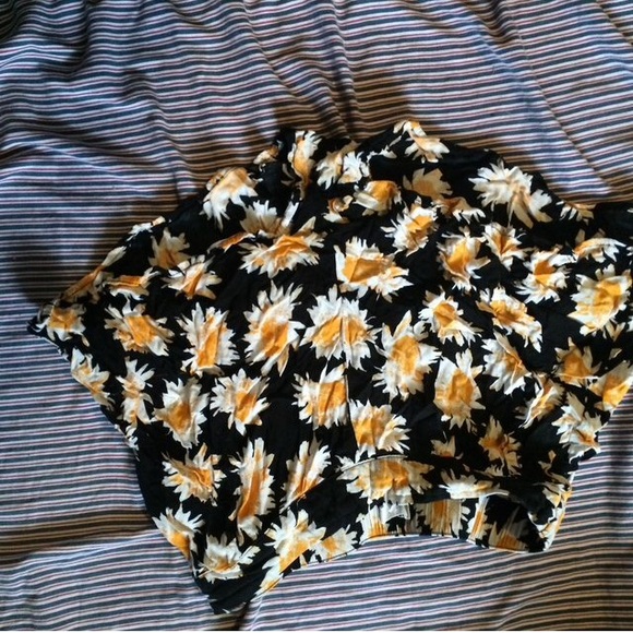 Daisy patterned shorts.