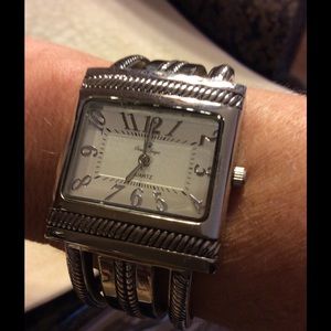 Cuff style silver watch