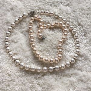 Two faux pearl necklaces