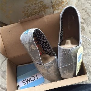 Never been worn silver glitter Toms!