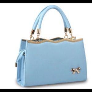 Gorgeous light blue handbag with gold detail