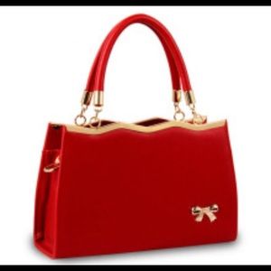 Gorgeous red handbag with gold detailing