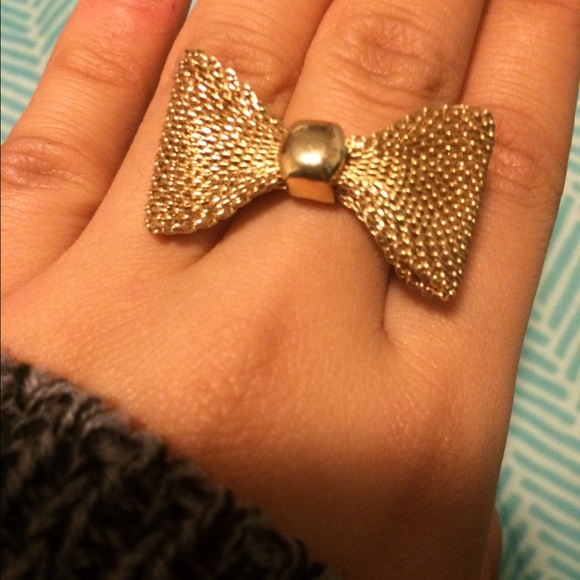 Gold colored bow ring